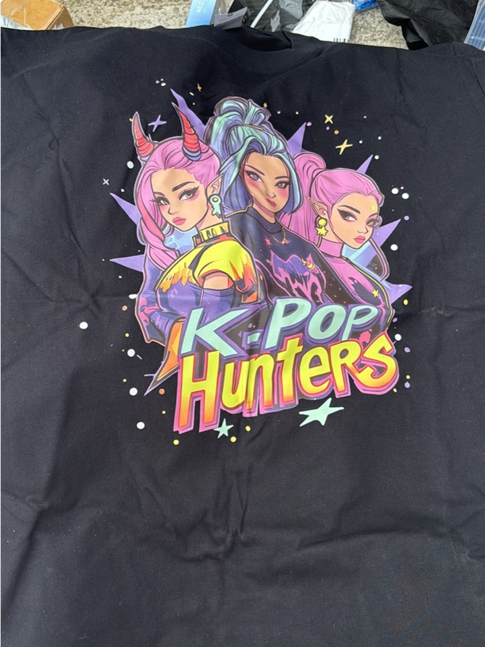 K-Pop Hunters Graphic tee with Neon Trio Artwork